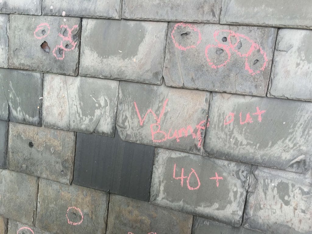 damaged slate roof repair